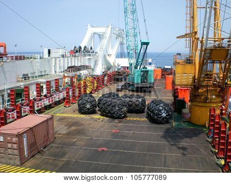 The cargo ship with the crane the top view. Pipelaying barge.