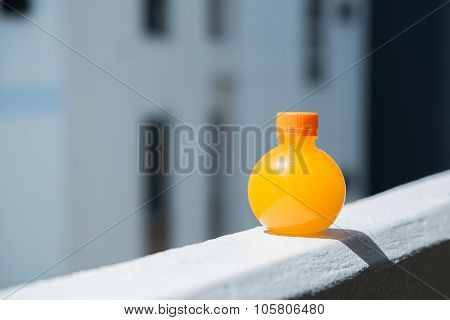 A Bottle Of Orange Juice