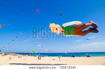 Fuerteventura - November 13: Viewers Watch From The Ground As Multicolored Kites Fill The Sky At 24T