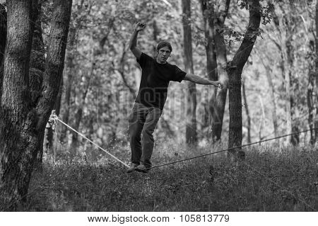 Man Walking On Slackline
