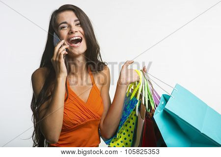 Surprised woman on shopping seasonal discounts.