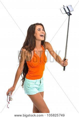 Merry lady is having fun on white background.