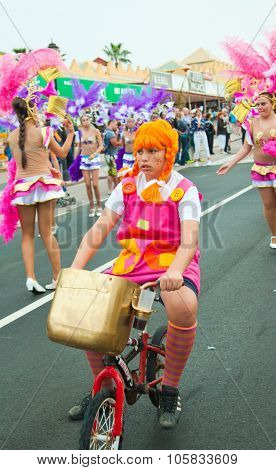 Corralejo - March 17: Dressed-up Child On A Bike Goes Along With Grand Carnival Parade, March 17, 20