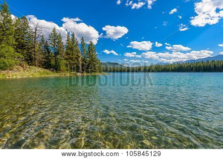 Majestic mountain lake in Canada. Anette Lake view in Jasper, Alberta, Canada. Rocky Mountains.