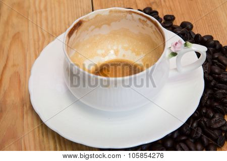 Empty Coffee Cup ,beautiful Light,empty Coffee Have Coffee Bean Beside On Wood Background