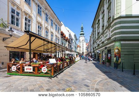 Tourists In Outdoor Restaurants In Bratislava