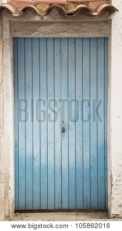 Old Blue Rusty Door Texture As A Background, Front View, Vertical