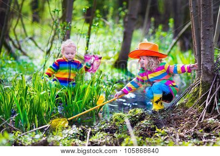 Children Playing Outdoors Catching Frog