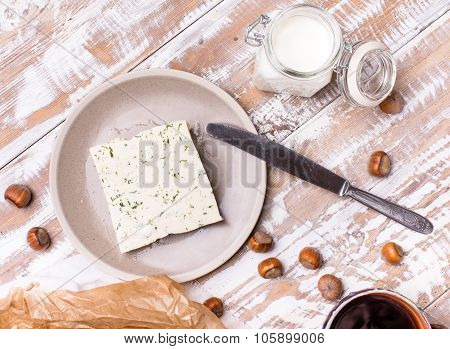 Cheese With Dill And Joghurt For Breakfast On Wooden Table
