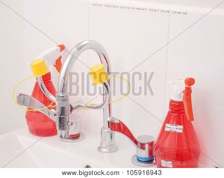 Specialized medical sink with eye wash attachments