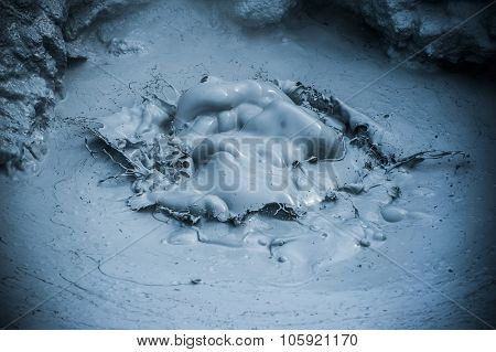 Hot boiling mud at fumarole is bubbling and exploding at mudpots, Hverir - Icelnad. When photographed at high speed nice sculptures could be seen