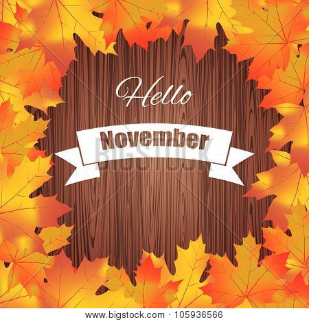 Hello November. Bright Colorful Autumn Leaves On Wood Background