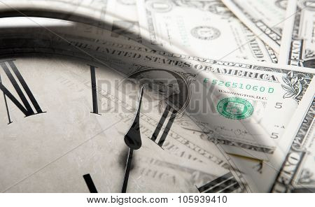 Clock On The Background Of Banknotes Dollars