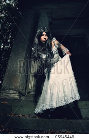 Witch from a crypt in the cemetery