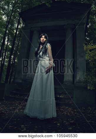 Witch from a crypt in the cemetery