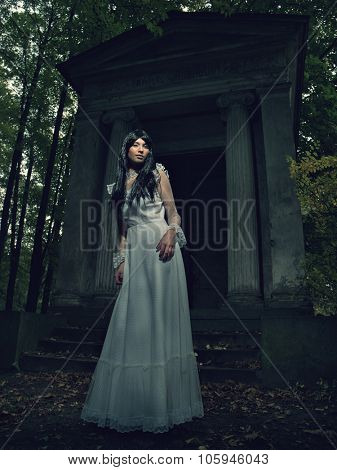 Witch from a crypt in the cemetery