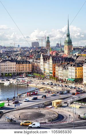 STOCKHOLM, SWEDEN - May 21, 2015: Old Town (Gamla Stan) in Stockholm and road traffic near Slussen subway stantion