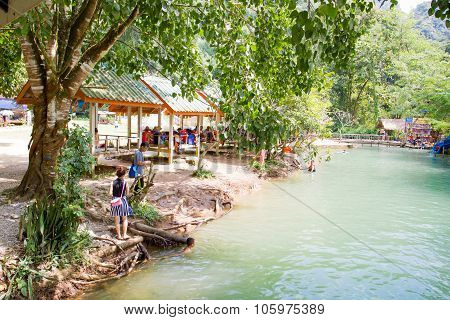 Tourists enjoy at Blue Lagoon, Vangvieng, Laos