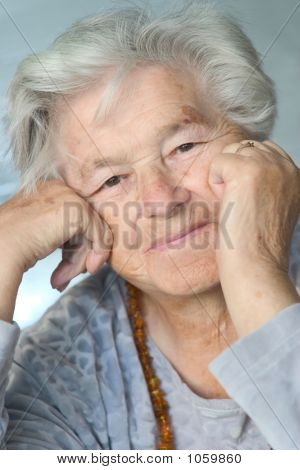Elderly Woman Leaning On Hands