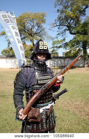 Japanese samurai with fire lock rifle
