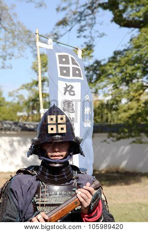 Japanese samurai with fire lock rifle