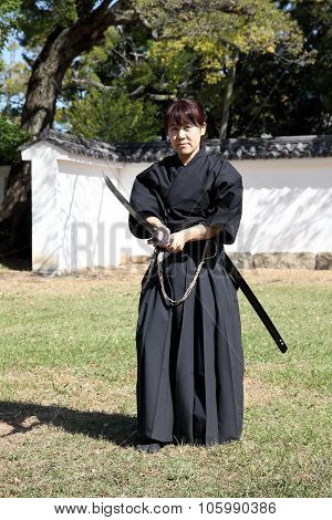 Japanese samurai with katana sword