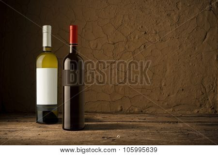 Still life with wine bottles, glasses and oak barrels  vintage