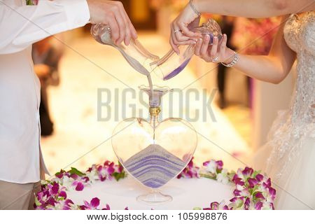 Blending Of The Sands At Wedding Ceremony