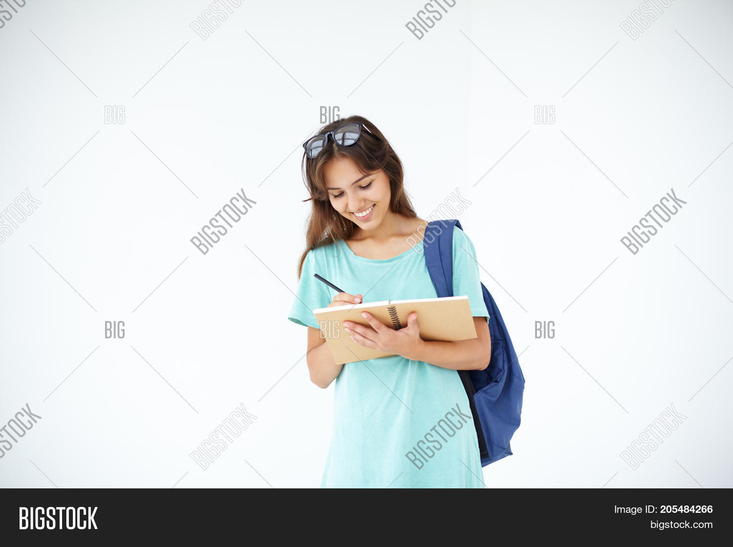 carrying backpack on one shoulder