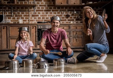Family In Kitchen