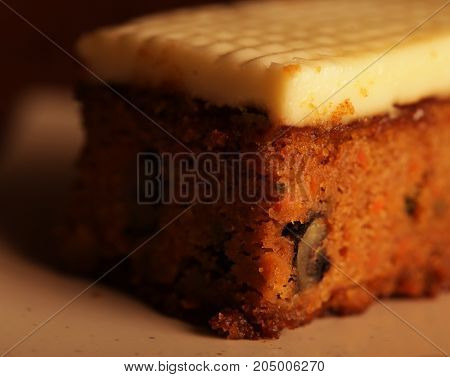 a slice of pumpkin cake on a white plate, tasy dessert