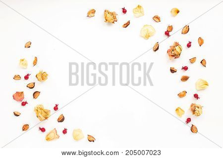 Dried Autumn Flowers, Rose Petals On White Background. Autumn Frame. Flat Lay, Top View, Copy Space