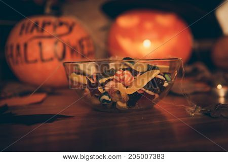 Close Up Focus Shot Of A Transparent Bowl With Many Diverse Colorful Tasy Yummies - Sugar Lolipops,
