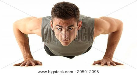 Fitness Man Wringing From The Floor Isoladed On White