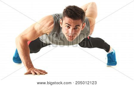Fitness Man Wringing From The Floor Isoladed On White