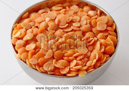 A close up of Masoor or red lentil