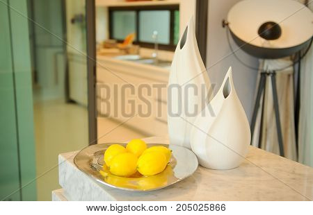 close up lemon on plate in kitchen