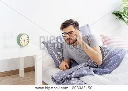 A man is overslept, he missed the alarm