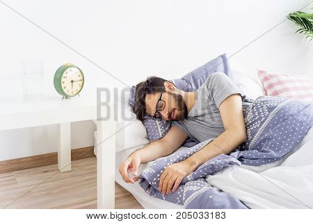 A man is overslept, he missed the alarm
