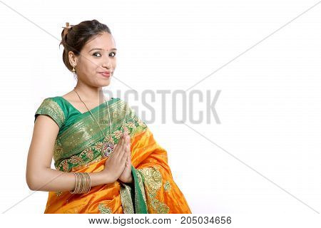 Happy young beautiful traditional Indian woman in traditional saree