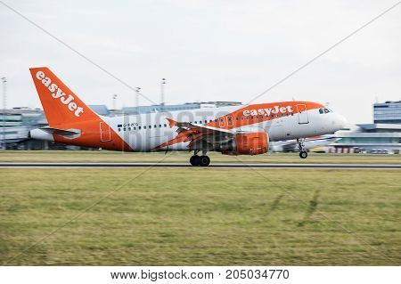 PRAGUE CZECH REPUBLIC - SEPTEMBER 20 2017: EasyJet Airline Airbus A319-111 lands to PRG Airport in Prague. EasyJet is the second-largest low-cost carrier in Europe.