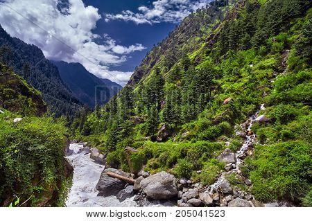 Landscape of a mountain river with traditional nature of Kullu valley. Naggar Himachal Pradesh. North India.