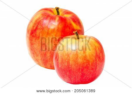 Two red apples closeup. Isolated objects. Juicy fruit. Healthy food. Vitamins.