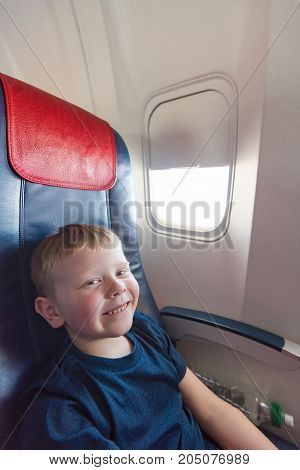 In The Cabin Of The Plane The Boy