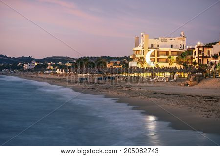 ALBANIA GOLEM- September 21 2015: Evening beach at sunset in the resort of Golem on the Adriatic coast.