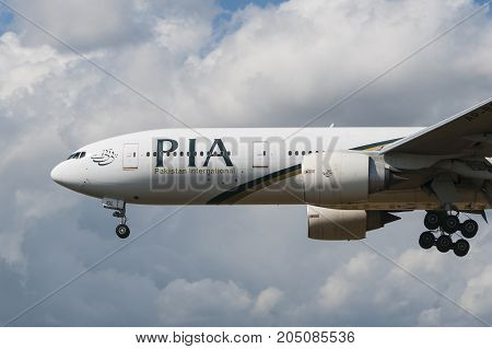 LONDON, UK - AUGUST, 3 2013; A Pakistan International Airlines (PIA) Boeing 777-240(ER) lands at Heathrow Airport in London