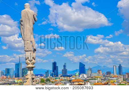 panorama of the city of Milan from the survey platform in the forefront the sculpture turned facing the city