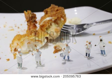Tiny Of Cook Are Talking In The Kitchen.