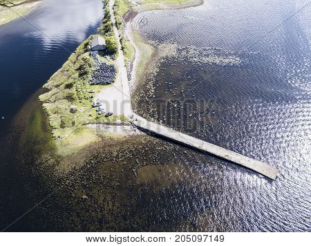 Aerial view of Taynuilt with pier seen from Loch Etive, Argyll, Scotland