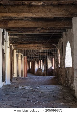 Brisighella (Ravenna Emilia Romagna Italy): the famous covered street known as via degli Asini or via del Borgo